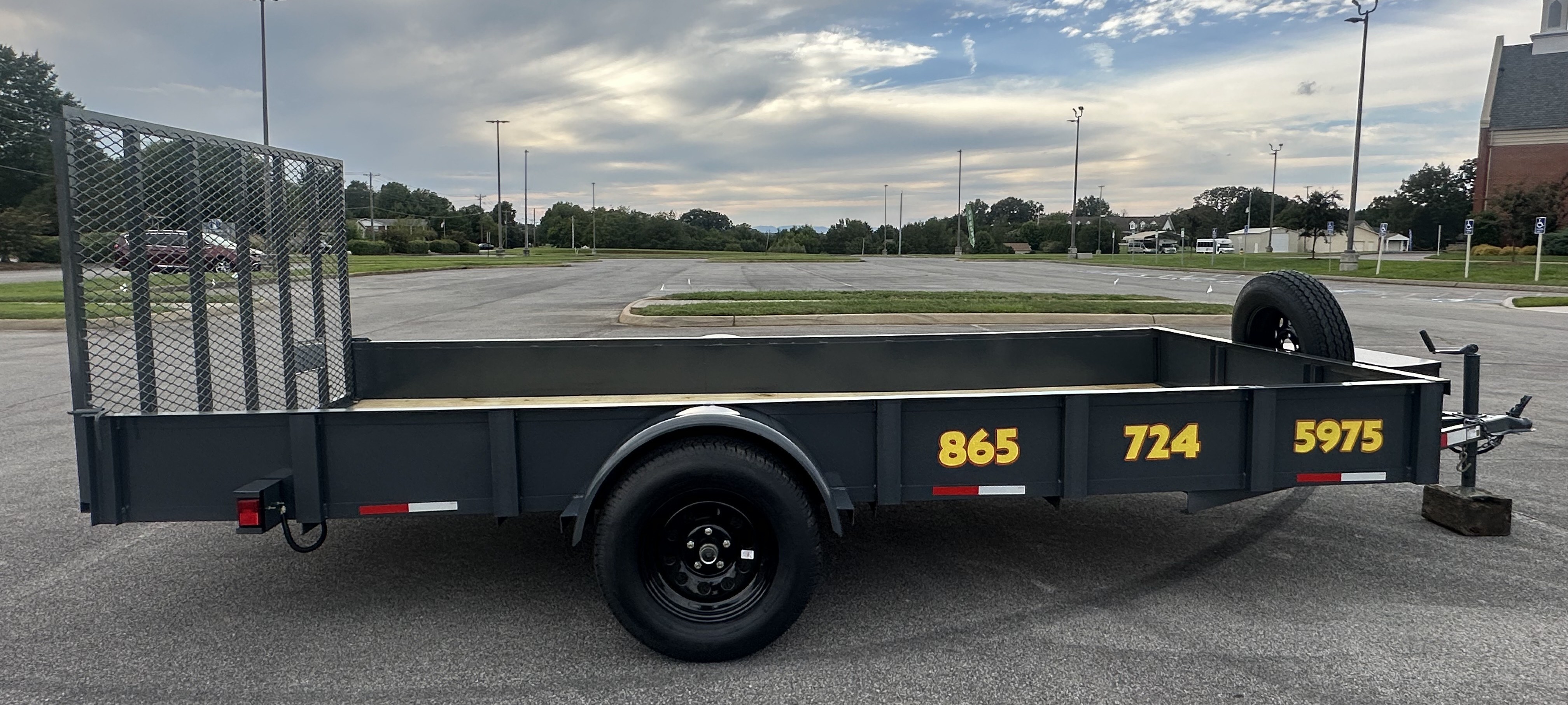 6.5x14 utility trailer with steel sides and 3500lb capacity - perfect for construction and hauling